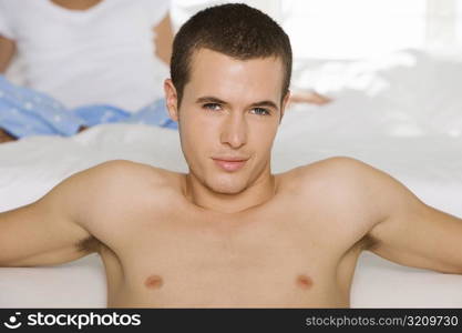 Close-up of a young man smiling