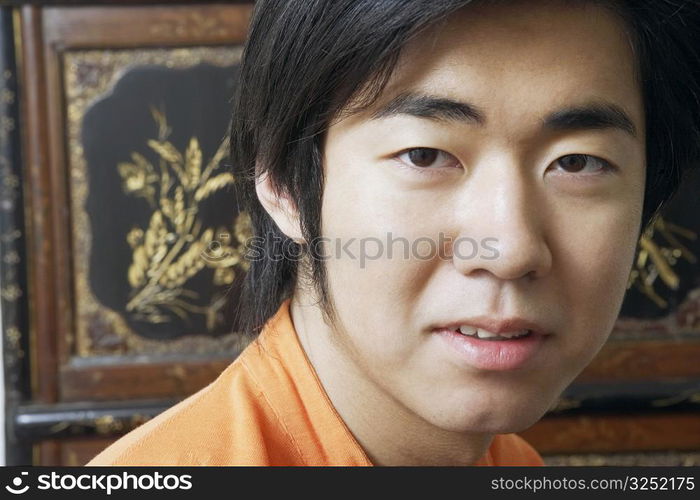 Close-up of a young man smiling