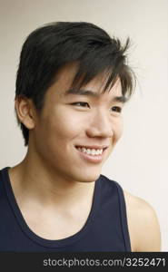 Close-up of a young man smiling