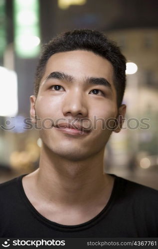 Close-up of a young man smiling