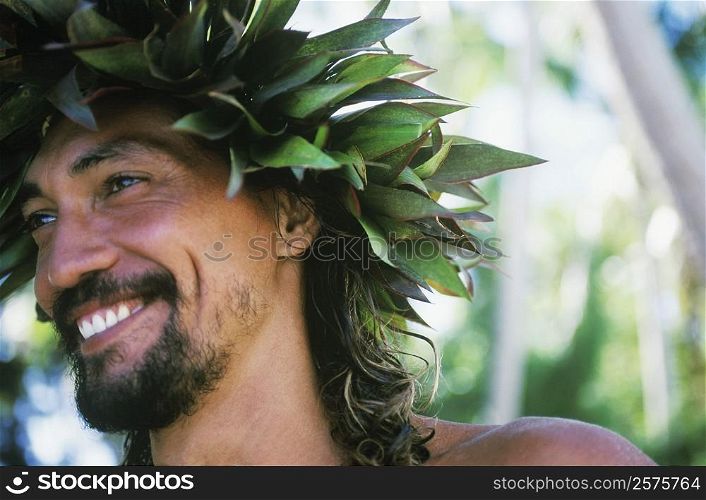 Close-up of a young man smiling, Hawaii, USA