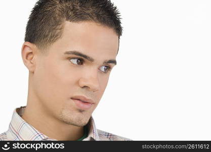 Close-up of a young man thinking