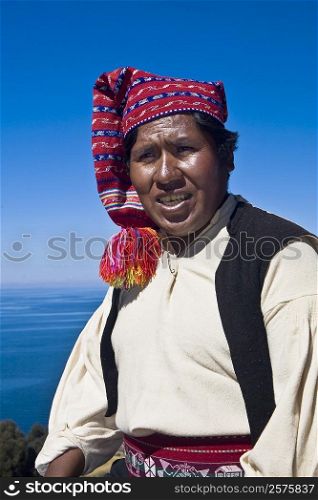 Close-up of a young man wearing headdress, Taquile Island, Lake Titicaca, Puno, Peru