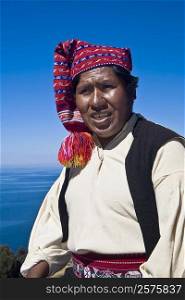Close-up of a young man wearing headdress, Taquile Island, Lake Titicaca, Puno, Peru