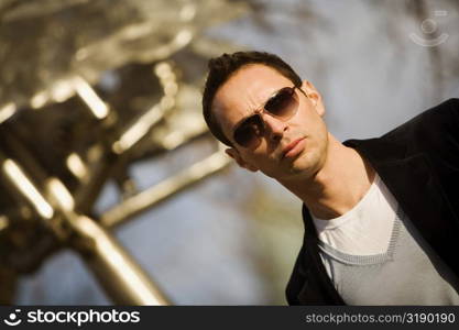 Close-up of a young man wearing sunglasses