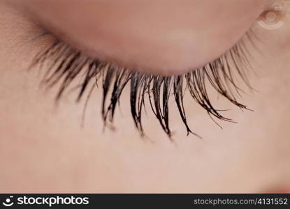 Close-up of a young woman&acute;s closed eye