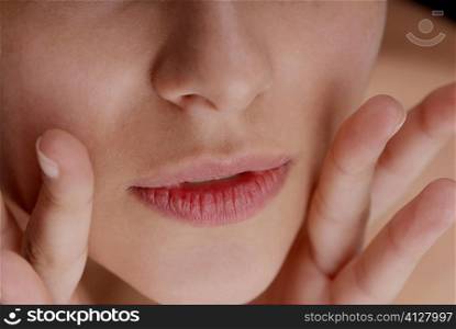 Close-up of a young woman&acute;s lips