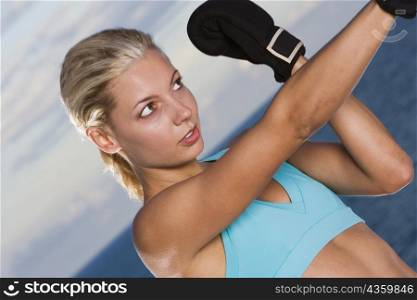 Close-up of a young woman boxing