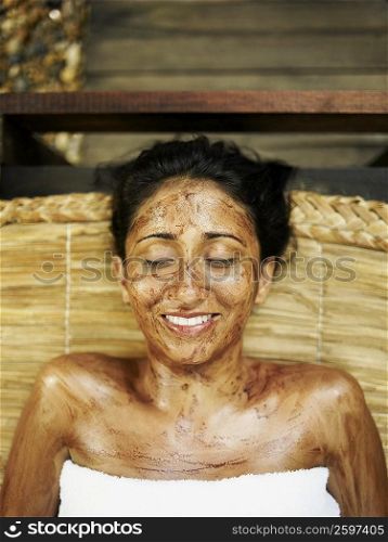 Close-up of a young woman getting spa treatment