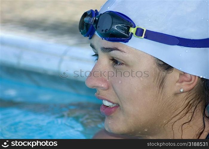 Close-up of a young woman in a swimming pool