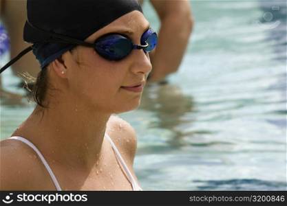 Close-up of a young woman in a swimming pool