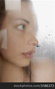 Close-up of a young woman in the bathroom