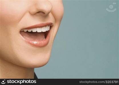 Close-up of a young woman laughing