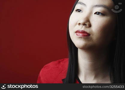 Close-up of a young woman looking away