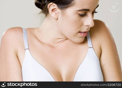 Close-up of a young woman looking down