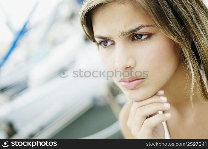 Close-up of a young woman looking serious