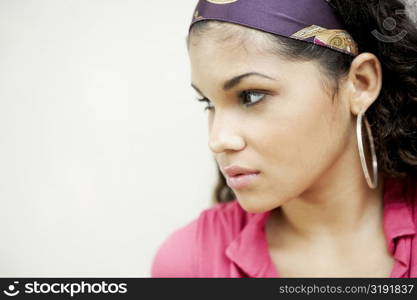 Close-up of a young woman looking worried