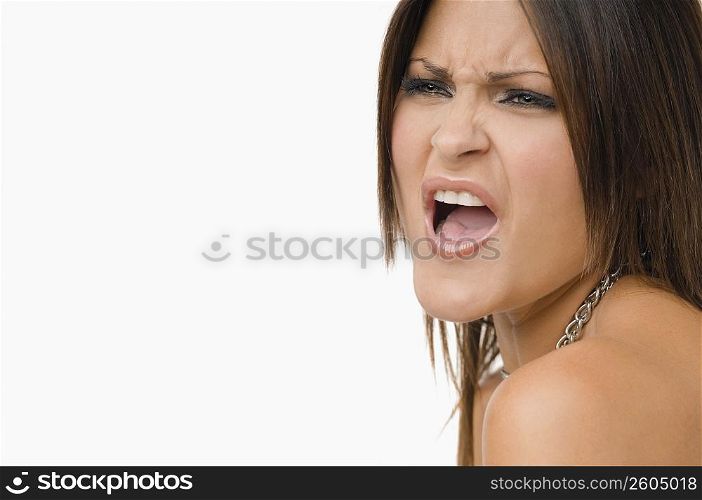 Close-up of a young woman shouting