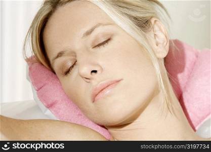 Close-up of a young woman sleeping