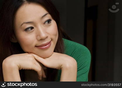 Close-up of a young woman smiling