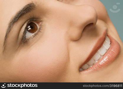 Close-up of a young woman smiling