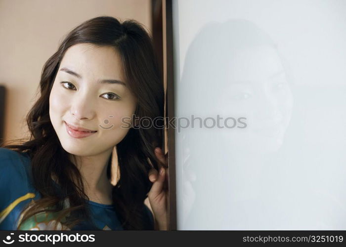 Close-up of a young woman smiling