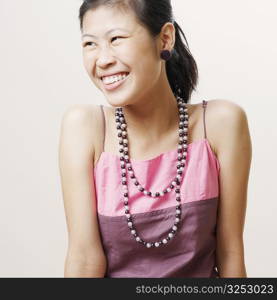 Close-up of a young woman smiling