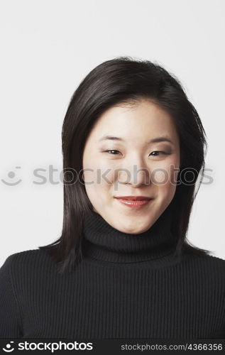 Close-up of a young woman smiling