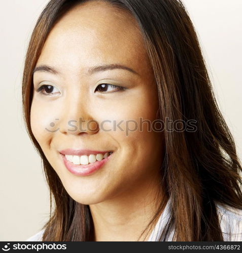 Close-up of a young woman smiling