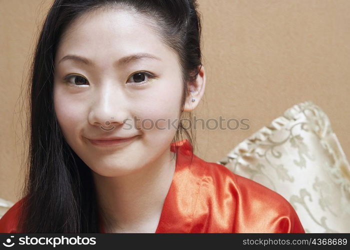 Close-up of a young woman smiling