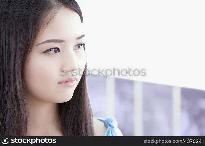 Close-up of a young woman staring