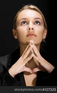 Close-up of a young woman thinking