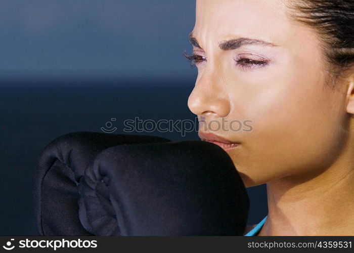 Close-up of a young woman thinking