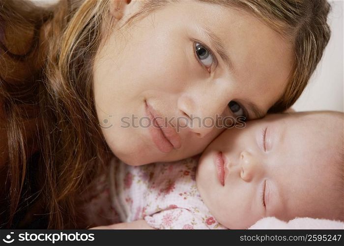 Close-up of a young woman with her daughter