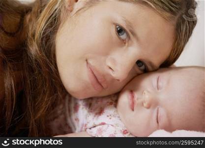 Close-up of a young woman with her daughter