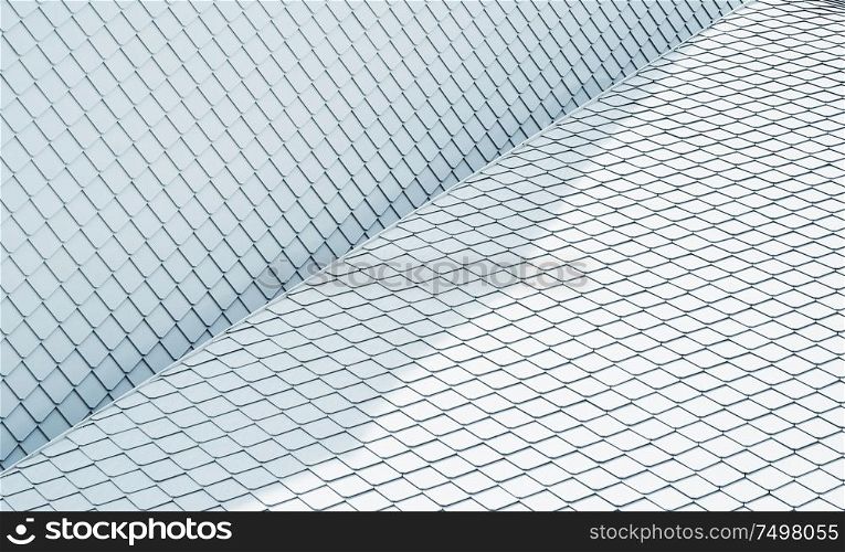 Close up of abstract geometric structure white wall and rooftop