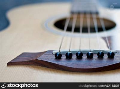 Close-up of acoustic guitar.