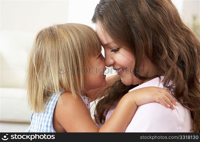 Close Up Of Affectionate Mother And Daughter At Home