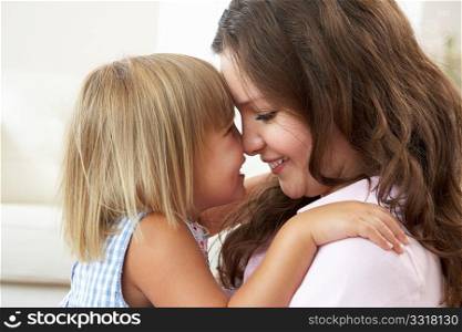 Close Up Of Affectionate Mother And Daughter At Home