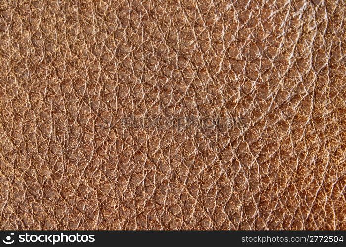 Close up of aged brown leather grain.
