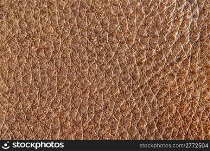 Close up of aged brown leather grain.