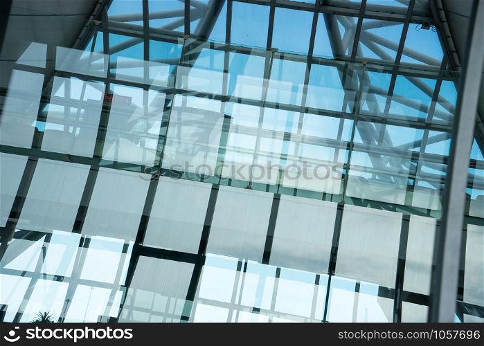 Close up of airport glass and wall