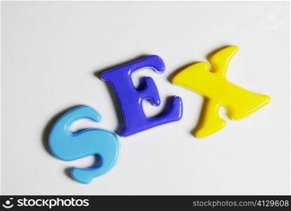 Close-up of alphabets spelling the word sex