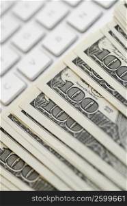 Close-up of American dollar bills on a laptop