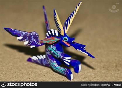 Close-up of an art representation of a dragon, Arrazola, Oaxaca State, Mexico
