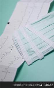 Close-up of an electrocardiogram report with a bandage