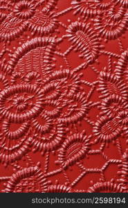 Close-up of an embossed floral design