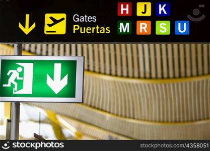 Close-up of an emergency exit sign at an airport, Madrid, Spain
