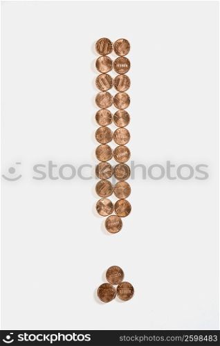 Close-up of an exclamation sign made of coins