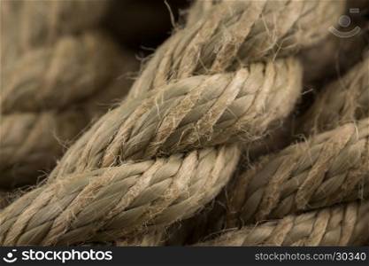 Close-up of an old frayed boat rope as a background